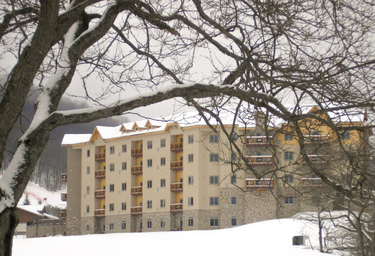 river rock on exterior of hotel