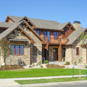 natural cobble ledge on exterior of home