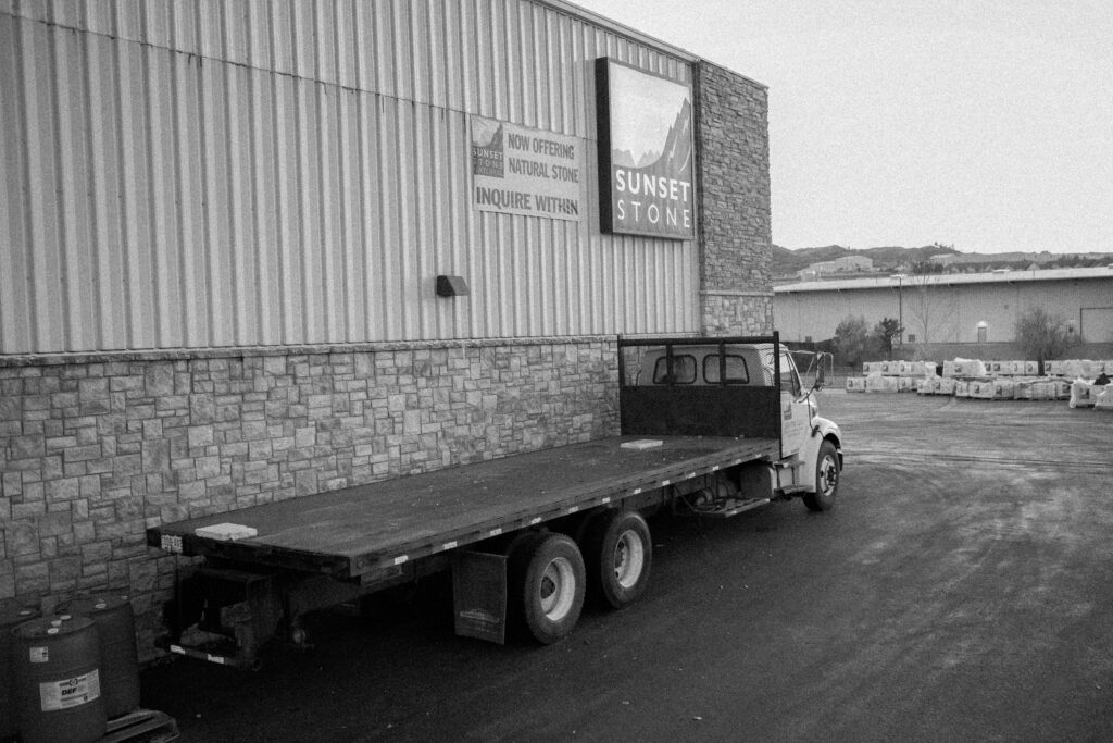 exterior of sunset stone warehouse/office building