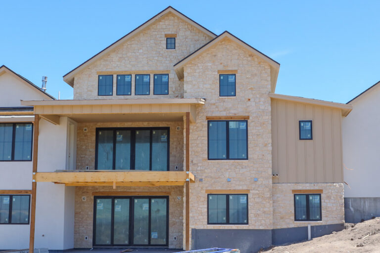 Champagne color Natural Stone on exterior of 3 story home