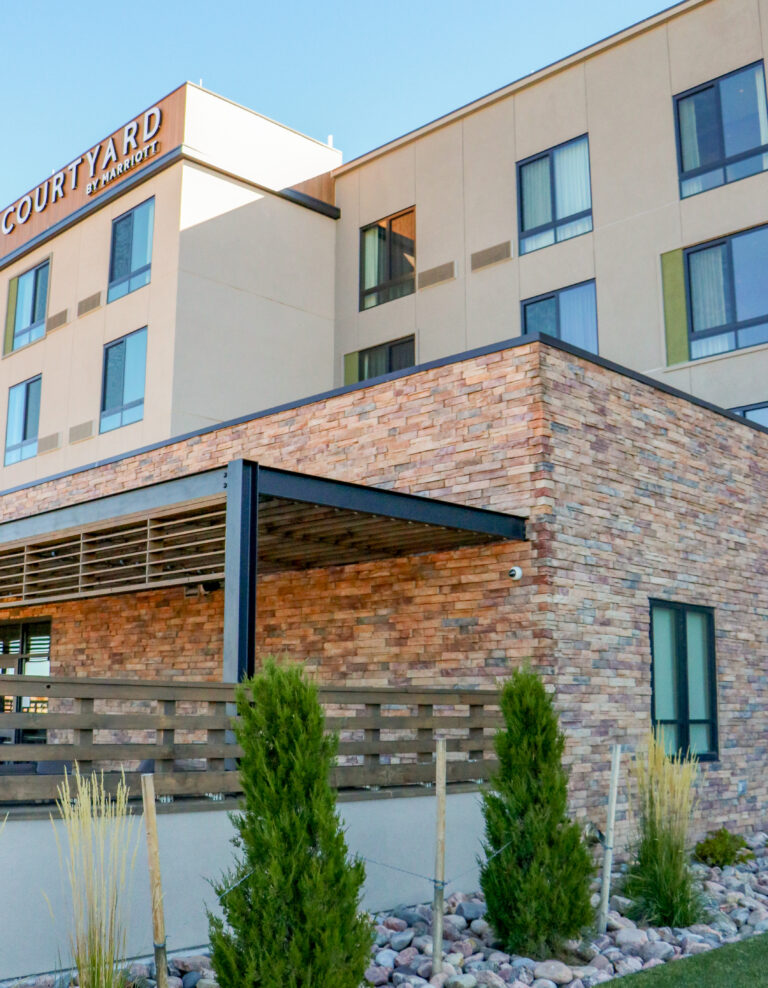 courtyard marriot with stone veneer on exterior