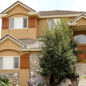 river rock on exterior of home