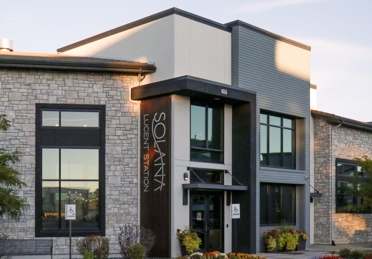 limestone on exterior of solana lucent station apartment complex