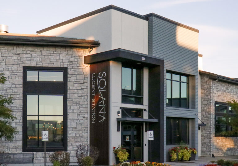 limestone on exterior of solana lucent station apartment complex