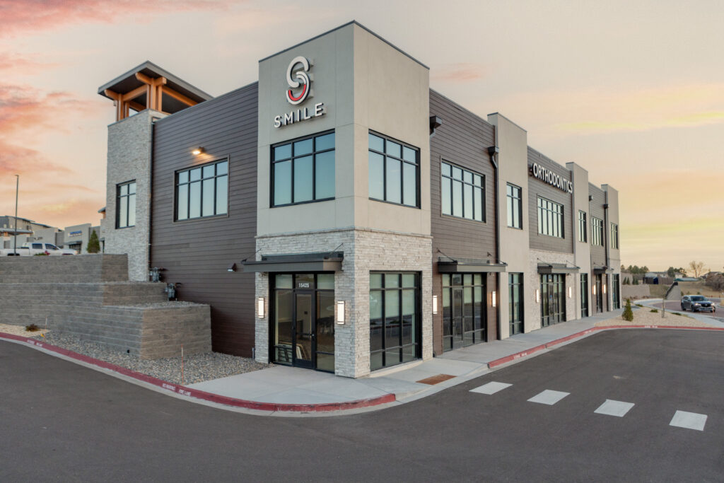 commercial building exterior, smile orthodontics, glacier dry stack ledge sunset stone veneer