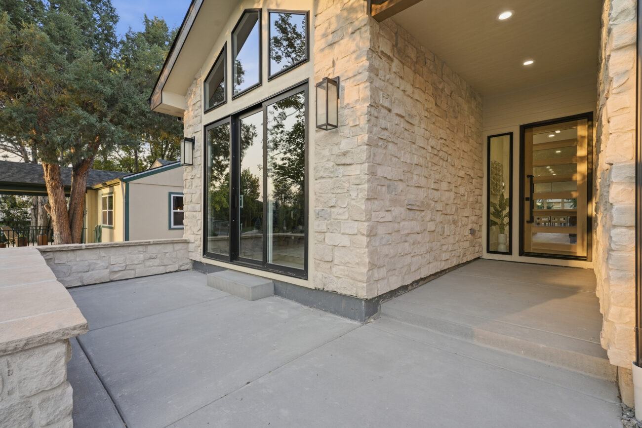 stone veneer throughout home entrance exterior