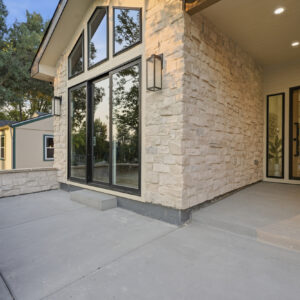 stone veneer throughout home entrance exterior